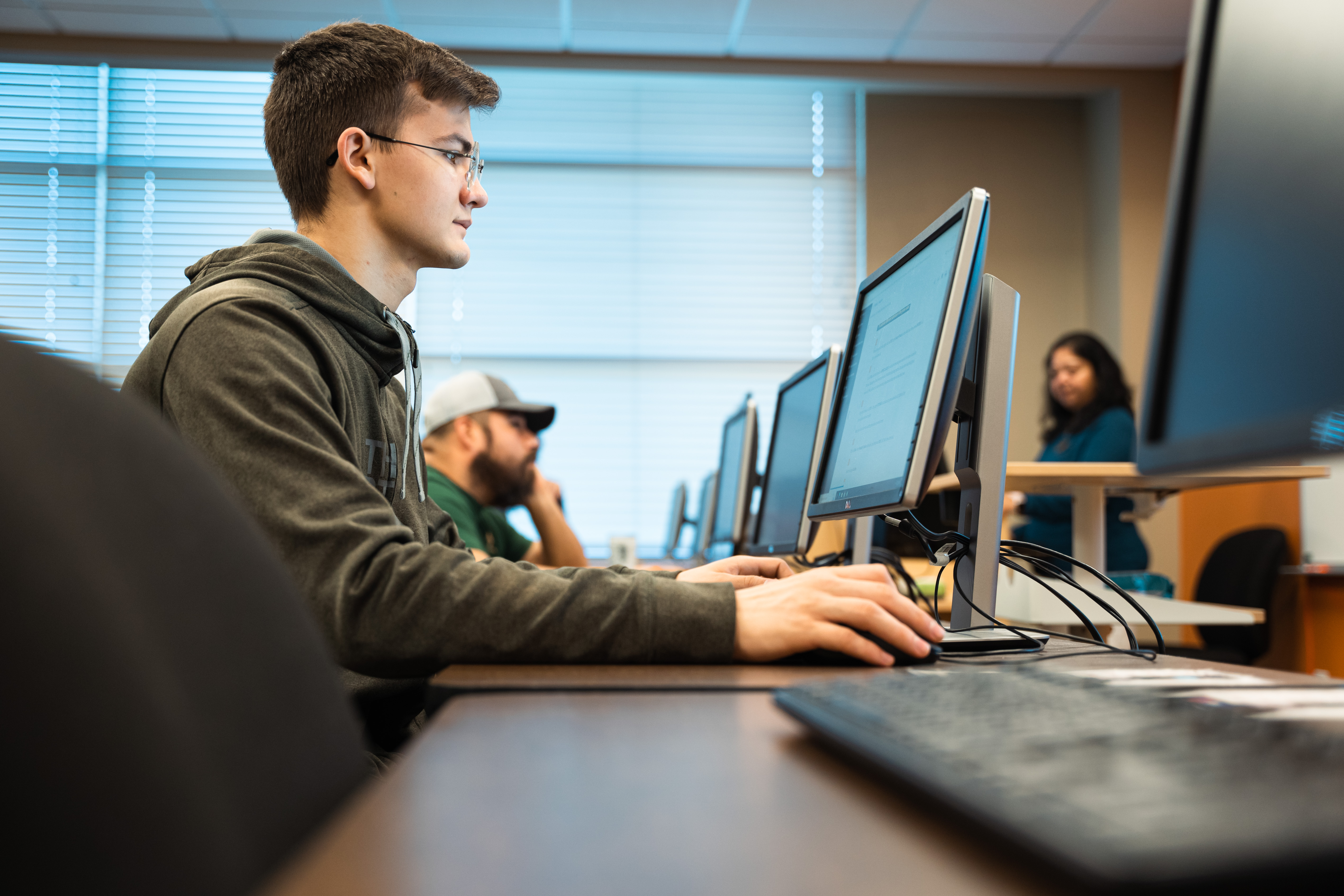 Man Typing on a Computer Man Typing on a Computer