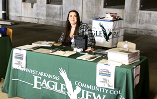 Woman sitting at an EagleView table 