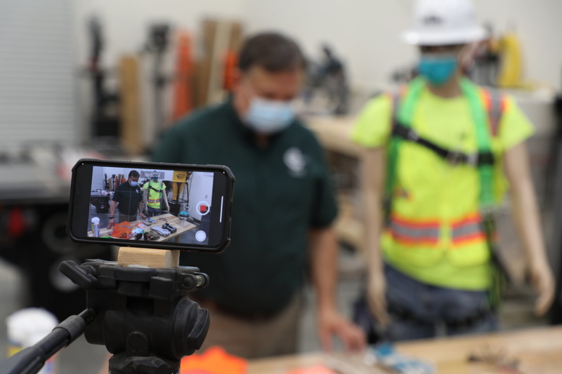 Construction Course Being Recorded on Phone Construction Course Being Recorded on Phone