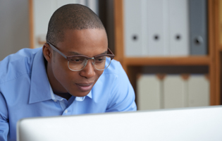 man working on computer