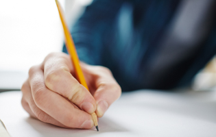 hand holding a pencil