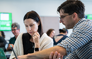 Staff helping student