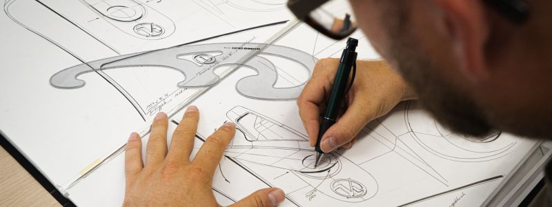 Man Drawing On Paper